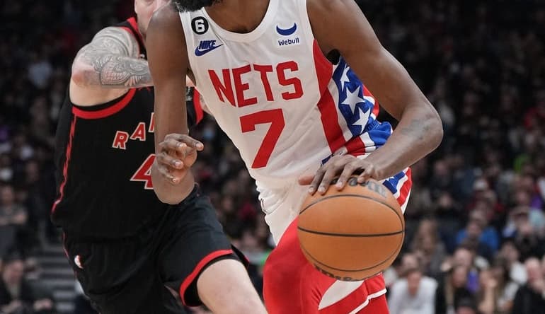 Dec 16, 2022; Toronto, Ontario, CAN; Brooklyn Nets forward Kevin Durant (7) controls the ball as Toronto Raptors forward Juancho Hernangomez (41) tries to defend during the second quarter at the Scotiabank Arena. Mandatory Credit: Nick Turchiaro-USA TODAY Sports