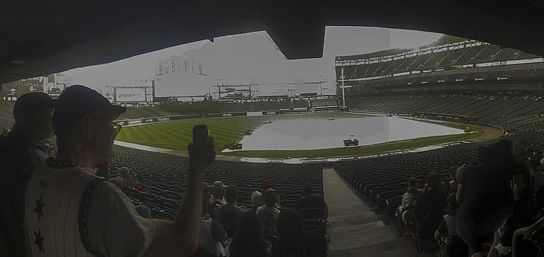 Jun 26, 2021; Chicago, Illinois, USA;  Fans wait out a rain delay before the game between the Chicago White Sox and the Seattle Mariners at Guaranteed Rate Field. Mandatory Credit: Matt Marton-USA TODAY Sports