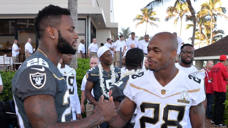 Caption: Jan 29, 2016; Kahuku, HI, USA; Oakland Raiders running back Latavius Murray (left) and Minnesota Vikings running back Adrian Peterson (28) during 2016 Pro Bowl photo day at Turtle Bay Resort. Mandatory Credit: Kirby Lee-USA TODAY Sports