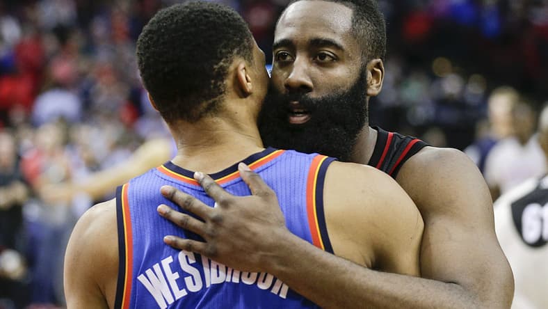 Jan 5, 2017; Houston, TX, USA; Houston Rockets guard James Harden (13) hugs Oklahoma City Thunder guard Russell Westbrook (0) after the Rockets defeated the City Thunder at Toyota Center. Houston Rockets won 118 to 116. Mandatory Credit: Thomas B. Shea-USA TODAY Sports