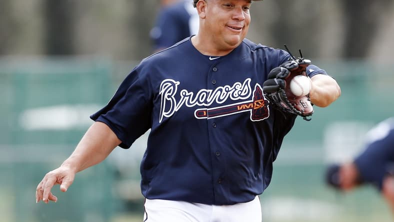 Feb 15, 2017; Lake Buena Vista, FL, USA; Atlanta Braves starting pitcher Bartolo Colon (40) catches a ball while covering first base during MLB spring training workouts at Champion Stadium. Mandatory Credit: Reinhold Matay-USA TODAY Sports