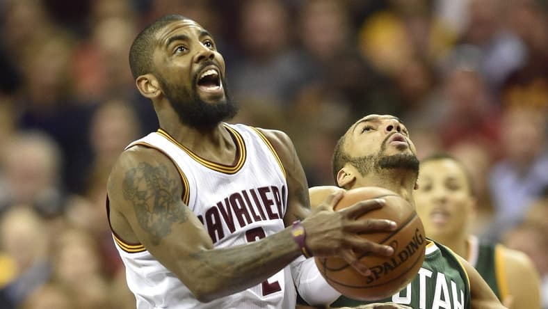 Kyrie Irving of the Cleveland Cavaliers gets sexy with Rudy Gobert of the Utah Jazz