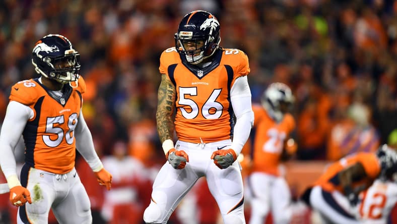 Nov 27, 2016; Denver, CO, USA; Denver Broncos outside linebacker Von Miller (58) and outside linebacker Shane Ray (56) react to a defensive stop in the first quarter against the Kansas City Chiefs at Sports Authority Field at Mile High. Mandatory Credit: Ron Chenoy-USA TODAY Sports