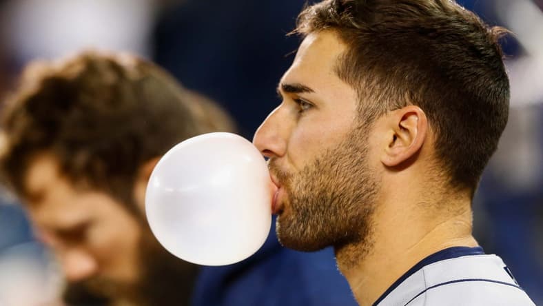 Apr 30, 2017; Toronto, Ontario, CAN; Tampa Bay Rays center fielder Kevin Kiermaier (39) blows a bubble during the national anthem prior to an MLB game against the Toronto Blue Jays at Rogers Centre. Mandatory Credit: Kevin Sousa-USA TODAY Sports