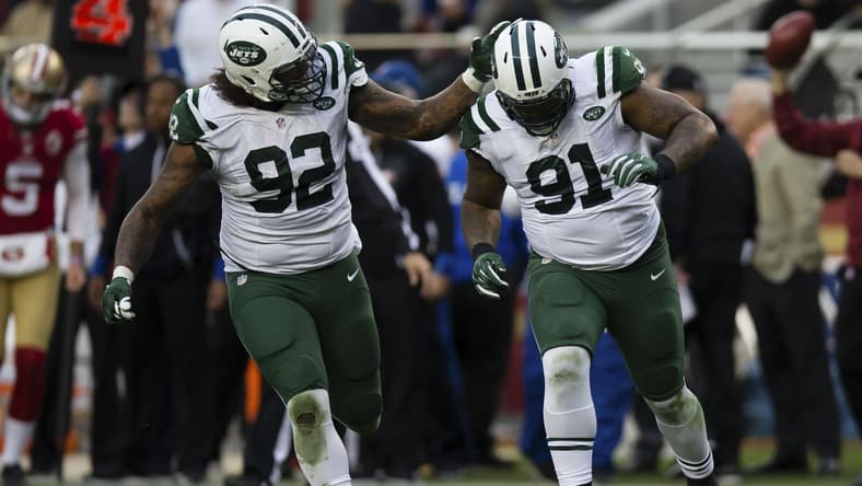 Jets Leonard Williams celebrates with defensive end Sheldon Richardson