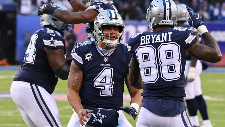Cowboys celebrate with quarterback Dak Prescott