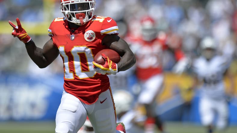Sep 9, 2018; Carson, CA, USA; Kansas City Chiefs wide receiver Tyreek Hill (10) returns a punt for a touchdown during the first quarter against the Los Angeles Chargers at StubHub Center. Mandatory Credit: Jake Roth-USA TODAY Sports