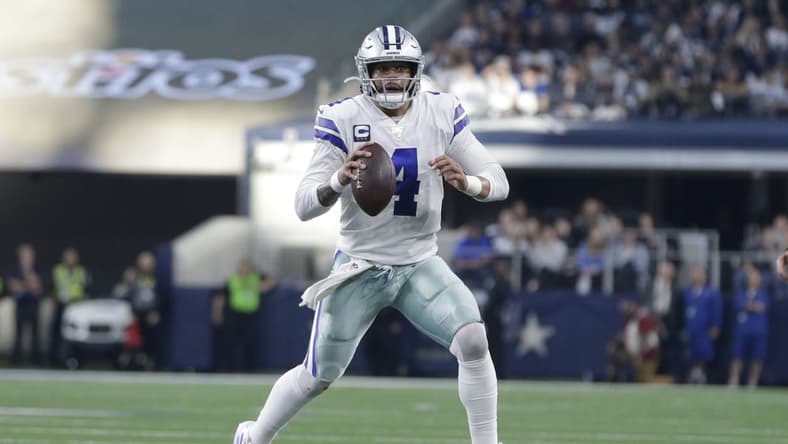Dak Prescott throws a pass against the Washington Redskins