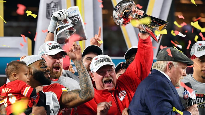 Feb 2, 2020; Miami Gardens, Florida, USA; Kansas City Chiefs head coach Andy Reid hoist the Vince Lombardi Trophy after defeating the San Francisco 49ers in Super Bowl LIV at Hard Rock Stadium. Mandatory Credit: Robert Deutsch-USA TODAY Sports