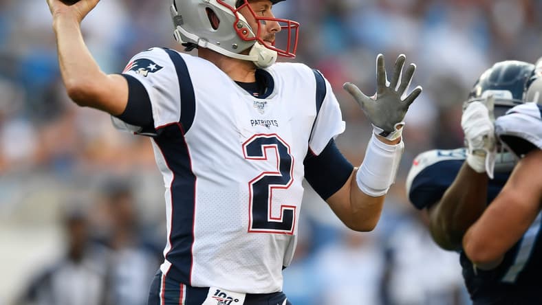 Jarrett Stidham throws a pass during game