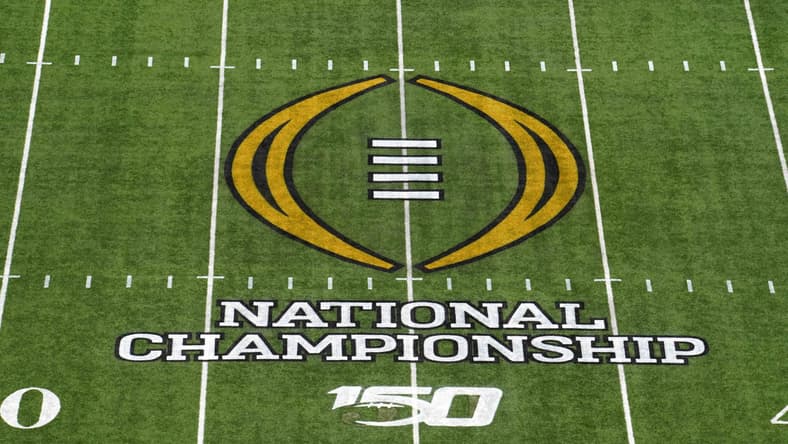 College FOotball Playoff logo at midfield