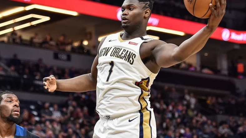Pelicans star Zion Williamson dunks the ball against the Timberwolves