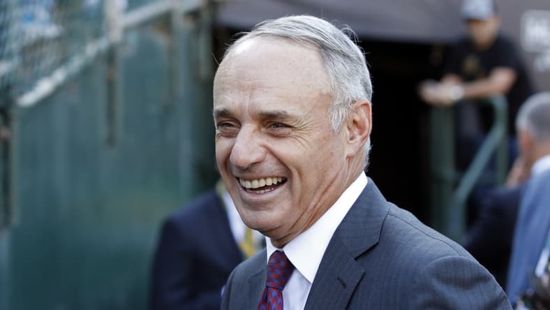 MLB commissioner Rob Manfred smiles