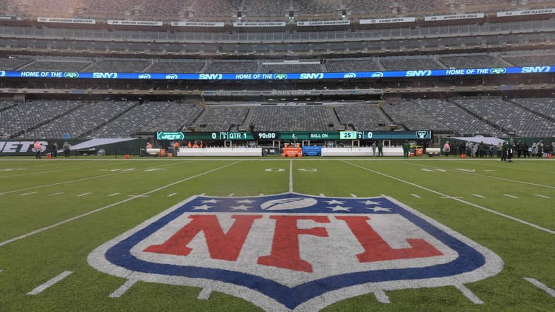 NFL logo at midfield during Jets football game