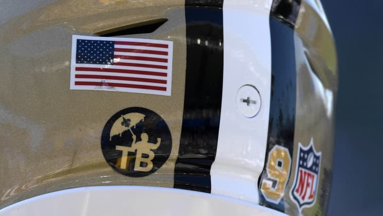 NFL decals on helmet fo New Orleans Saints QB Drew Brees