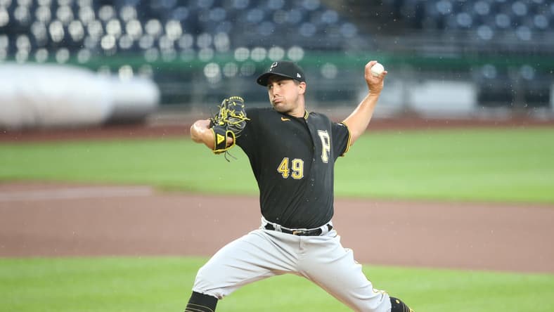 Pirates pitcher Derek Holland was ejected