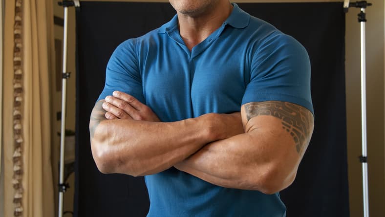 Dwayne Johnson posing for Fast and the Furious spin off.