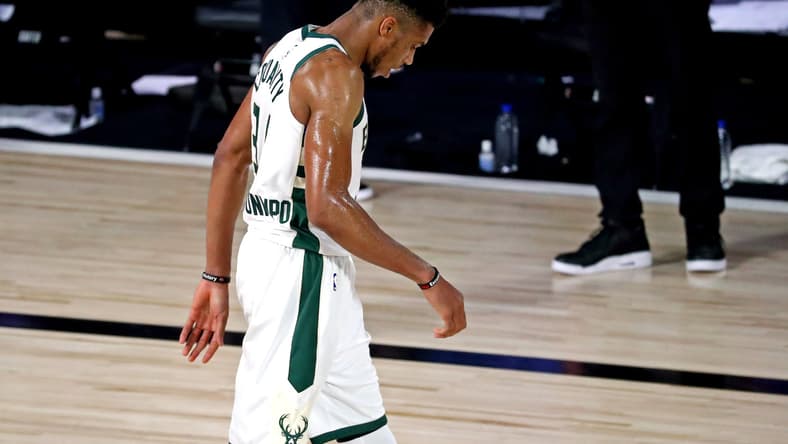 Milwaukee Bucks star Giannis Antetokounmpo walks off court