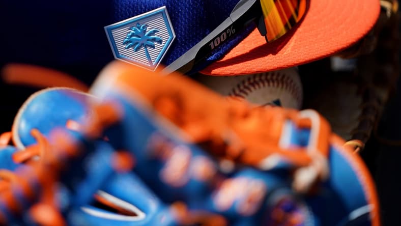 Mar 23, 2019; Lake Buena Vista, FL, USA; A view of the Grapefruit League logo on the hat of New York Mets second baseman Robinson Cano (24) prior to the game against the Atlanta Braves at Champion Stadium. Mandatory Credit: Aaron Doster-USA TODAY Sports