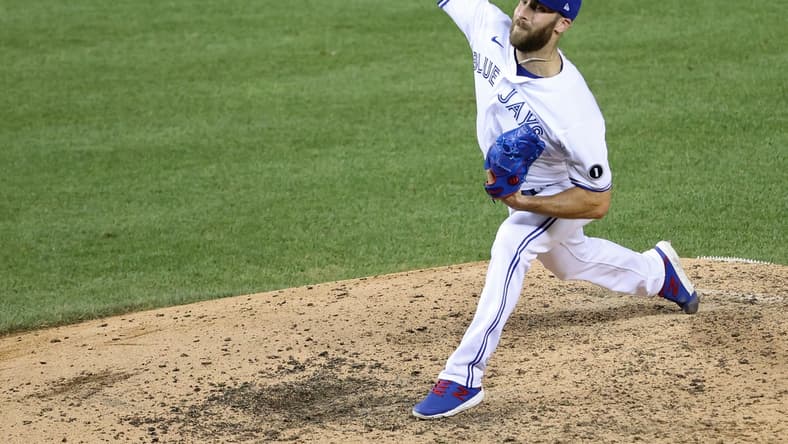Jul 29, 2020; Washington, DC, USA; Toronto Blue Jays relief pitcher Anthony Bass (52) pitches against the Washington Nationals in the ninth inning at Nationals Park. Mandatory Credit: Geoff Burke-USA TODAY Sports