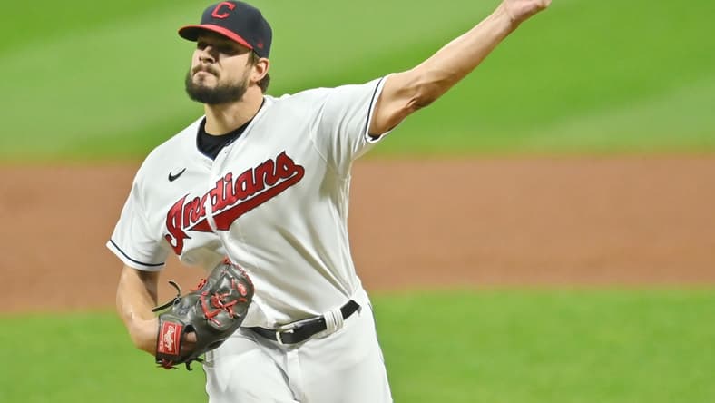 Sep 24, 2020; Cleveland, Ohio, USA; Cleveland Indians relief pitcher Brad Hand (33) throws a pitch against the Chicago White Sox during the ninth inning at Progressive Field. Mandatory Credit: Ken Blaze-USA TODAY Sports