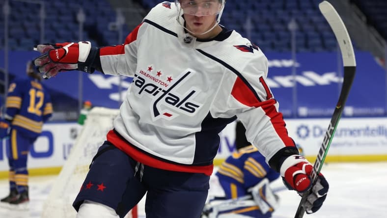 Jan 14, 2021; Buffalo, New York, USA; Washington Capitals left wing Jakub Vrana (13) celebrates his goal during the third period against the Buffalo Sabres at KeyBank Center. Mandatory Credit: Timothy T. Ludwig-USA TODAY Sports