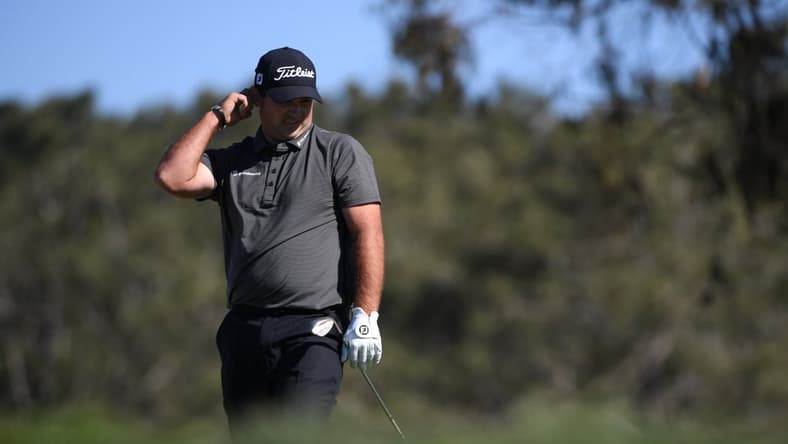 Jan 30, 2021; San Diego, California, USA; Patrick Reed reacts after a shot on the 12th green during the third round of the Farmers Insurance Open golf tournament at Torrey Pines Municipal Golf Course - South Course. Mandatory Credit: Orlando Ramirez-USA TODAY Sports