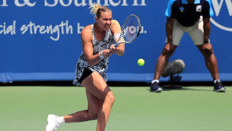 Aug 10, 2019; Mason, OH, USA; Kaia Kanepi (EST) returns a shot against Barbora Strycova (CZE) during the Western and Southern Open tennis tournament at Lindner Family Tennis Center. Mandatory Credit: Aaron Doster-USA TODAY Sports