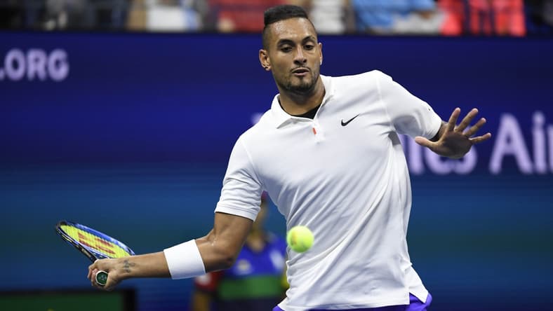 Aug 31, 2019; Flushing, NY, USA; Nick Kyrgios of Australia returns a shot against Andrey Rublev of Russia in a third round match on day six of the 2019 U.S. Open tennis tournament at USTA Billie Jean King National Tennis Center. Mandatory Credit: Danielle Parhizkaran-USA TODAY Sports