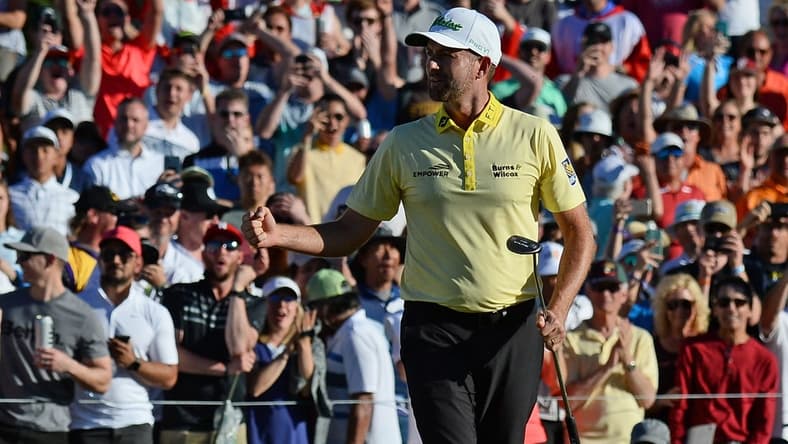 Feb 2, 2020; Scottsdale, Arizona, USA; Webb Simpson celebrates after winning the Waste Management Phoenix Open golf tournament at TPC Scottsdale. Mandatory Credit: Joe Camporeale-USA TODAY Sports