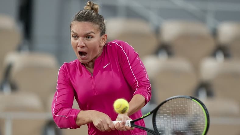 Oct 4, 2020; Paris, France; Simona Halep (ROU) in action during her match against Iga Swiatek (POL) on day eight at Stade Roland Garros. Mandatory Credit: Susan Mullane-USA TODAY Sports