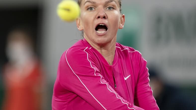 Oct 4, 2020; Paris, France; Simona Halep (ROU) in action during her match against Iga Swiatek (POL) on day eight at Stade Roland Garros. Mandatory Credit: Susan Mullane-USA TODAY Sports