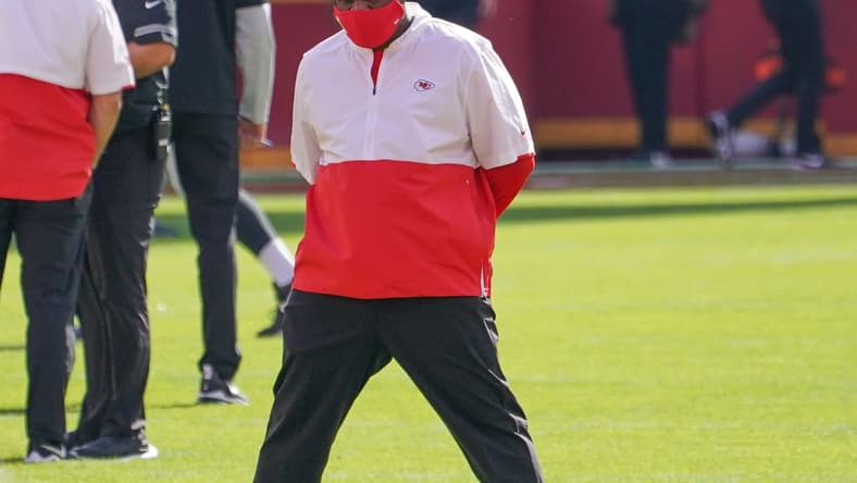 Oct 11, 2020; Kansas City, Missouri, USA; Kansas City Chiefs offensive coordinator Eric Bieniemy watches warm ups before the game against the Las Vegas Raiders at Arrowhead Stadium. Mandatory Credit: Denny Medley-USA TODAY Sports