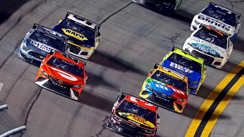 Feb 11, 2021; Daytona Beach, FL, USA; NASCAR Cup Series driver Austin Dillion (3) and NASCAR Cup Series driver Bubba Wallace (23) race for the finish line during the Bluegreen Vacations Duel 2 at Daytona International Speedway. Mandatory Credit: Mark J. Rebilas-USA TODAY Sports