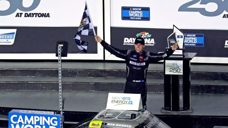 Feb 12, 2021; Daytona Beach, FL, USA; Camping World Truck Series driver Ben Rhodes (99) celebrates winning the NextEra Energy 250 at Daytona International Speedway. Mandatory Credit: Mark J. Rebilas-USA TODAY Sports