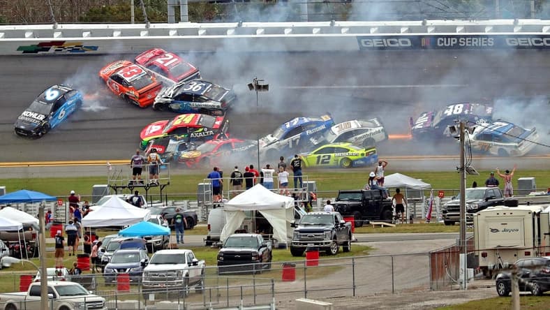 Feb 14, 2021; Daytona Beach, Florida, USA; NASCAR Cup Series drivers Ryan Newman (6), Erik Jones (43), Tyler Reddick (8), Martin Truex Jr. (19), Aric Almirola (10), Chris Buescher (17) and Alex Bowman (48) wreck during the Daytona 500 at Daytona International Speedway. Mandatory Credit: Mark J. Rebilas-USA TODAY Sports
