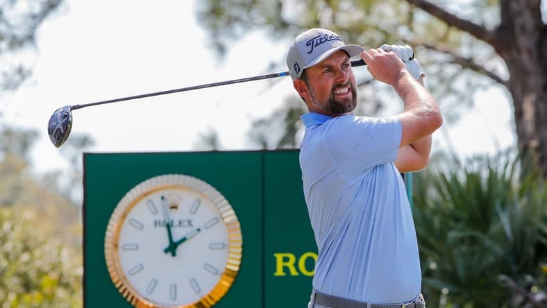 Feb 25, 2021; Bradenton, Florida, USA; Webb Simpson plays his shot from the tenth tee during the first round of World Golf Championships at The Concession golf tournament at The Concession Golf Club. Mandatory Credit: Mike Watters-USA TODAY Sports