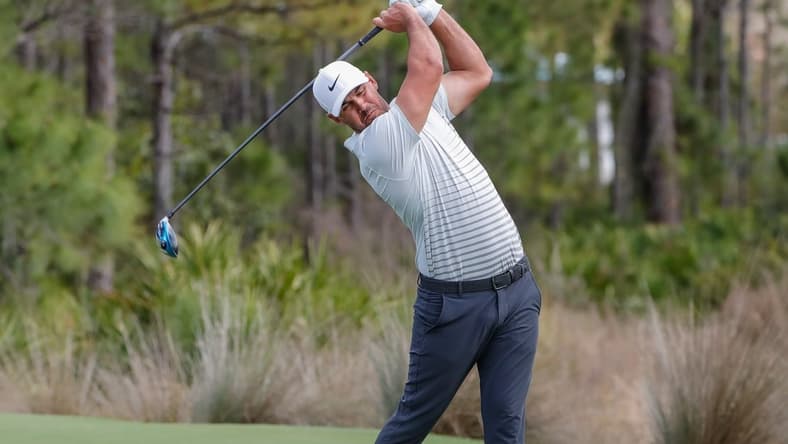 Feb 26, 2021; Bradenton, Florida, USA; Brooks Koepka plays his shot from the third tee during the second round of World Golf Championships at The Concession golf tournament at The Concession Golf Club. Mandatory Credit: Mike Watters-USA TODAY Sports