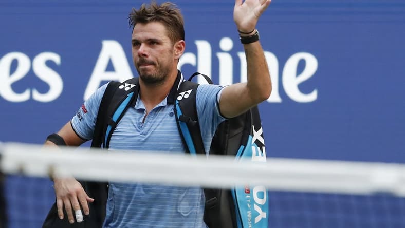 Sep 3, 2019; Flushing, NY, USA; Stan Wawrinka of Switzerland waves to the crowd while leaving the court after his match against Daniil Medvedev of Russia (not pictured) in a quarterfinal match on day nine of the 2019 US Open tennis tournament at USTA Billie Jean King National Tennis Center. Mandatory Credit: Geoff Burke-USA TODAY Sports