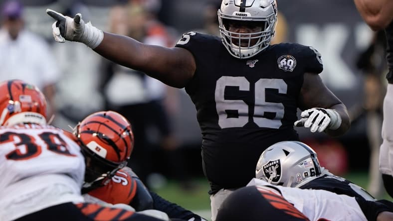 Nov 17, 2019; Oakland, CA, USA; Oakland Raiders offensive guard Gabe Jackson (66) signals against the Cincinnati Bengals during the fourth quarter at the Oakland Coliseum. Mandatory Credit: Stan Szeto-USA TODAY Sports