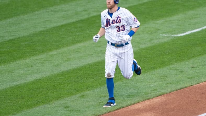 Sep 3, 2020; New York City, New York, USA; New York Mets third baseman Todd Frazier (33) rounds the bases after hitting a home run during the second inning against the New York Yankees at Citi Field. Mandatory Credit: Gregory Fisher-USA TODAY Sports