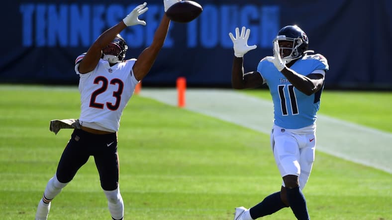 Nov 8, 2020; Nashville, Tennessee, USA; Chicago Bears cornerback Kyle Fuller (23) breaks up a pass intended for Tennessee Titans wide receiver A.J. Brown (11) during the first half at Nissan Stadium. Mandatory Credit: Christopher Hanewinckel-USA TODAY Sports