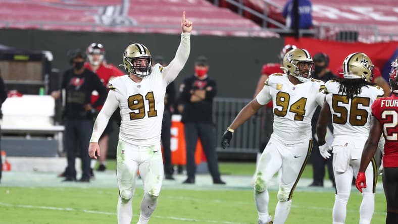 Nov 8, 2020; Tampa, Florida, USA; New Orleans Saints defensive end Trey Hendrickson (91) celebrates as he makes a sack against the Tampa Bay Buccaneers during the second half at Raymond James Stadium. Mandatory Credit: Kim Klement-USA TODAY Sports