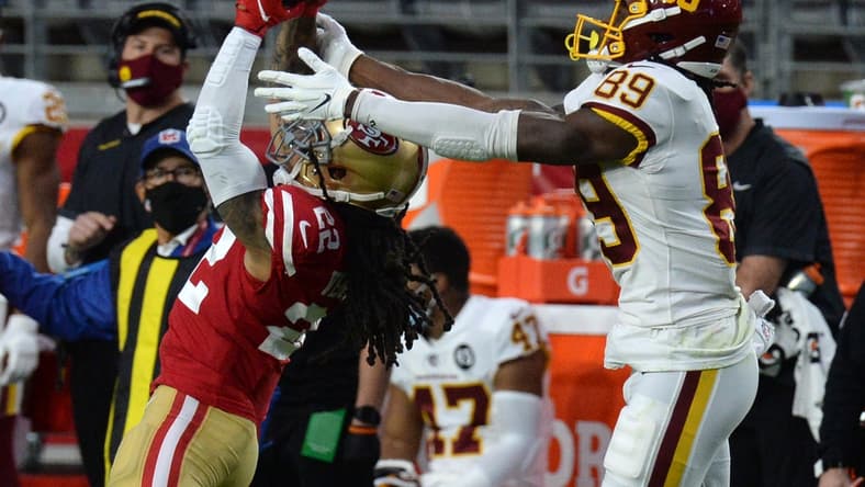 Dec 13, 2020; Glendale, Arizona, USA; San Francisco 49ers cornerback Jason Verrett (22) intercepts a pass intended for Washington Football Team wide receiver Cam Sims (89) during the first half at State Farm Stadium. Mandatory Credit: Joe Camporeale-USA TODAY Sports