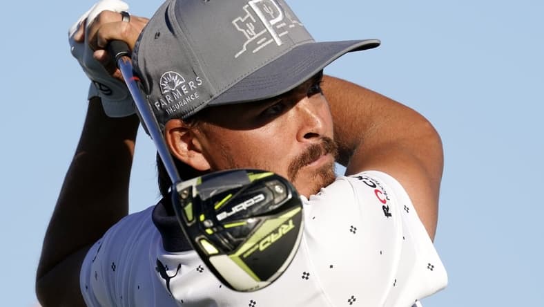 Feb 4, 2021; Scottsdale, Arizona, USA; Rickie Fowler plays his tee shot on the 15th hole during round one of the Waste Management Phoenix Open at TPC Scottsdale. Mandatory Credit: Rob Schumacher-USA TODAY NETWORK