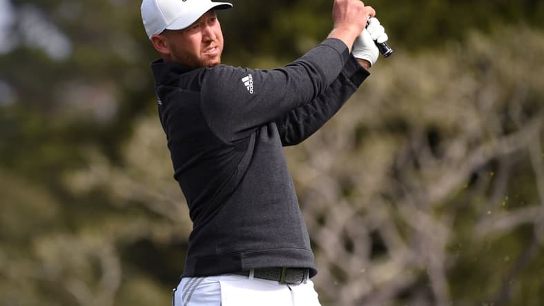 Feb 14, 2021; Pebble Beach, California, USA; Daniel Berger plays his shot from the 16th tee during the final round of the AT&T Pebble Beach Pro-Am golf tournament at Pebble Beach Golf Links. Mandatory Credit: Orlando Ramirez-USA TODAY Sports