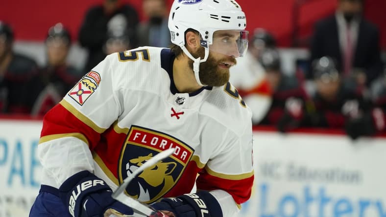 Feb 17, 2021; Raleigh, North Carolina, USA; Florida Panthers defenseman Aaron Ekblad (5) skates against the Carolina Hurricanes at PNC Arena. Mandatory Credit: James Guillory-USA TODAY Sports