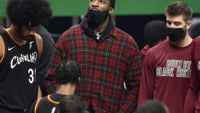 Feb 19, 2021; Cleveland, Ohio, USA; Cleveland Cavaliers center Andre Drummond (3), center, stands in the huddle during a timeout in the first quarter against the Denver Nuggets at Rocket Mortgage FieldHouse. Mandatory Credit: David Richard-USA TODAY Sports
