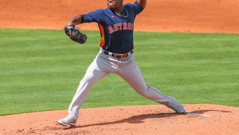 Mar 2, 2021; Port St. Lucie, Florida, USA;  Houston Astros starting pitcher Framber Valdez (59) delivers a pitch against the New York Mets in the first inning at Clover Park. Mandatory Credit: Sam Navarro-USA TODAY Sports