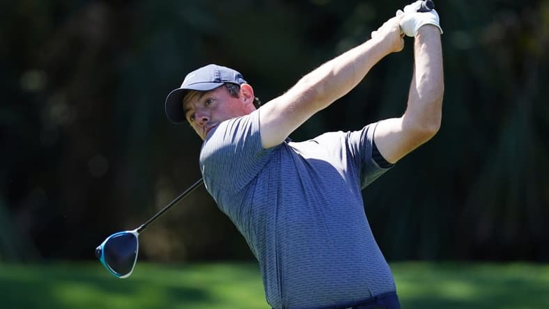 Mar 11, 2021; Ponte Vedra Beach, Florida, USA; Rory McIlroy hits his tee shot on the 7th hole during the first round of The Players Championship golf tournament at TPC Sawgrass - Stadium Course. Mandatory Credit: Jasen Vinlove-USA TODAY Sports